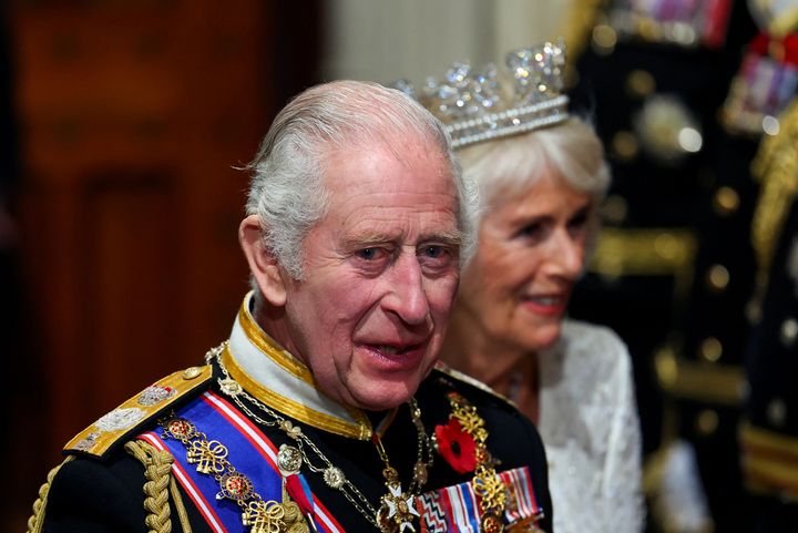 King Charles III and Queen Camilla depart the Houses of Parliament after attending the State Opening of Parliament on November 7, 2023 