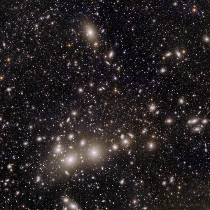 The image shows 1000 galaxies belonging to the Perseus Cluster, and more than 100,000 additional galaxies further away in the background, each containing up to hundreds of billions of stars.