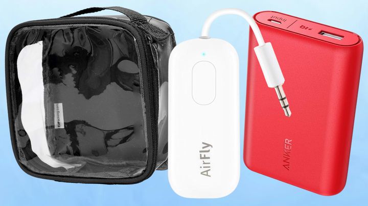 A toiletry bag, AirFly and Anker battery charger