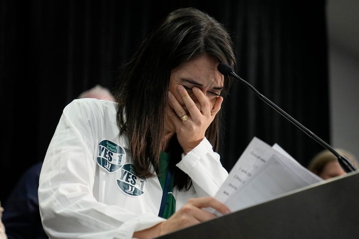 Dr. Marcela Acevedo, founder of Ohio Physicians for Reproductive Rights, is overcome with emotion Tuesday as she speaks to Issue 1 supporters at a watch party in Columbus.