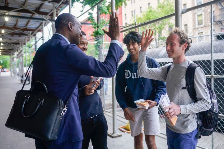 Salaam talks to campaign volunteers while canvasing in Harlem back in May.