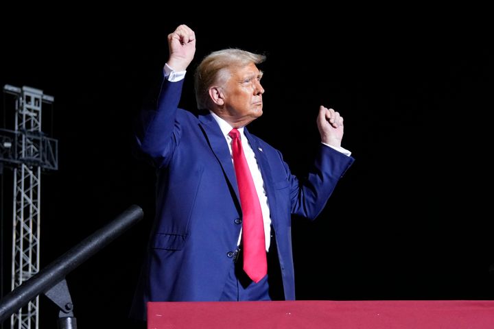 Former President Donald Trump wraps up a campaign rally in Hialeah, Florida, on Wednesday in lieu of joining the GOP presidential debate. The Biden campaign attacked him repeatedly.