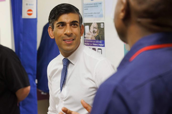 Britain's Prime Minister Rishi Sunak meets with staff as he tours Moorfields Eye Hospital in London on October 26, 2023. (Photo by Jamie Lorriman / POOL / AFP) (Photo by JAMIE LORRIMAN/POOL/AFP via Getty Images)