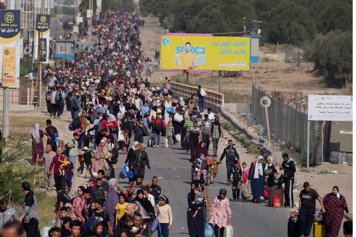 Palestinians flee to the southern Gaza Strip along Salah al-Din Street in Bureij, Gaza Strip, on Nov. 9, 2023. 