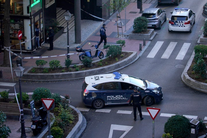 Police officers stand at the area following a shooting in Madrid, Spain, Thursday, Nov. 9, 2023. Spanish police say that veteran Spanish right-wing politician Alejandro Vidal-Quadras has been taken to a hospital in Madrid after being shot in a street in the capital. (AP Photo/Andrea Comas)