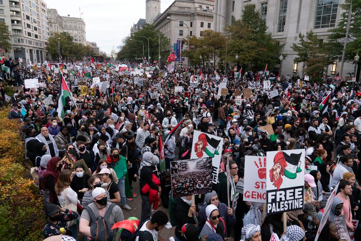 With the U.S Capitol in the background, thousands of anti-war activists rally during a pro-Palestinian demonstration asking for a cease-fire in Gaza, at the Freedom Plaza in Washington, Saturday, Nov. 4, 2023. (AP Photo/Jose Luis Magana)