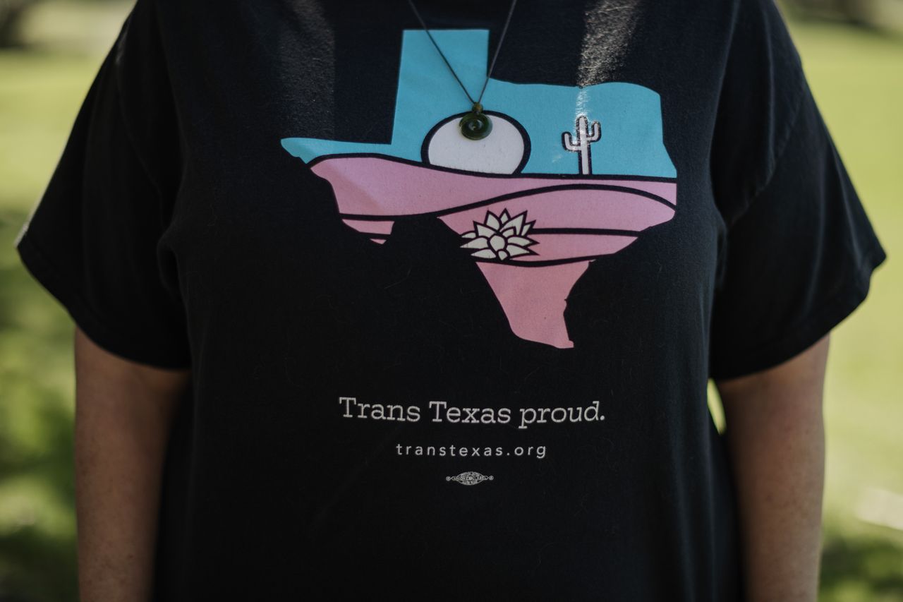 Lauren wearing a "Trans Texas Proud" T-shirt.