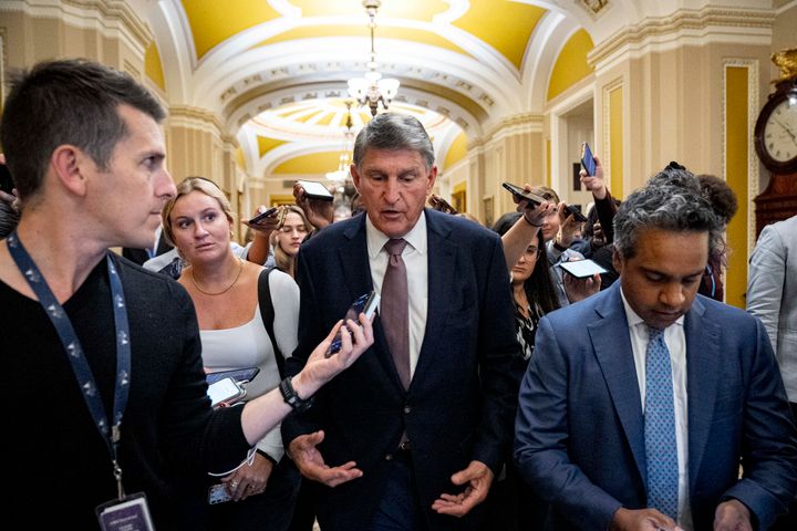Sen. Joe Manchin, D-W.Va., speaks to reporters as he walks out of a closed-door caucus meeting after the House approved a 45-day funding bill to keep federal agencies open, Sept. 30, 2023, in Washington. (AP Photo/Andrew Harnik, File)