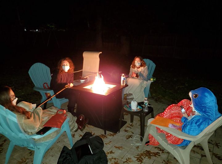 The author and her friends take part in a socially distanced Halloween hangout in 2020.