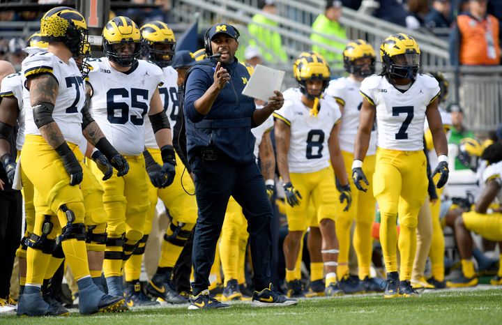 UNIVERSITY PARK, PA - NOVEMBER 11: Michigan acting head coach and offensive coordinator Sherrone Moore coaches on the side line during the Michigan Wolverines versus Penn State Nittany Lions game on November 11, 2023 at Beaver Stadium in University Park, PA. (Photo by Randy Litzinger/Icon Sportswire via Getty Images)