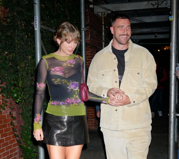 Taylor Swift and Travis Kelce photographed holding hands during a night out on October 15, 2023 in New York City. 