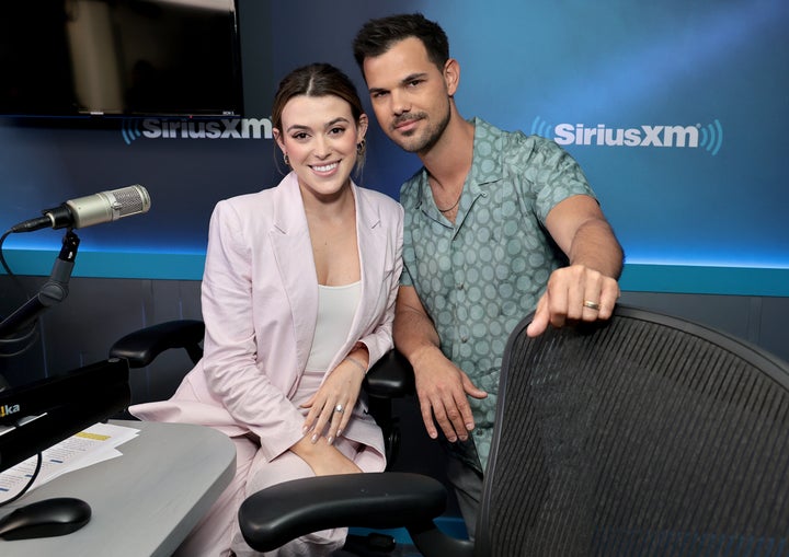 Tay Lautner (L) and Taylor Lautner tied the knot after nearly three years of dating. (Photo by Jamie McCarthy/Getty Images)