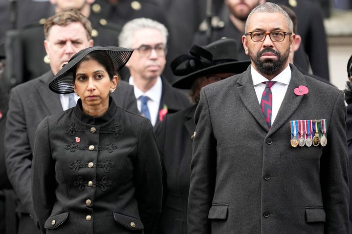 James Cleverly standing alongside Suella Braverman at the Cenotaph yesterday.
