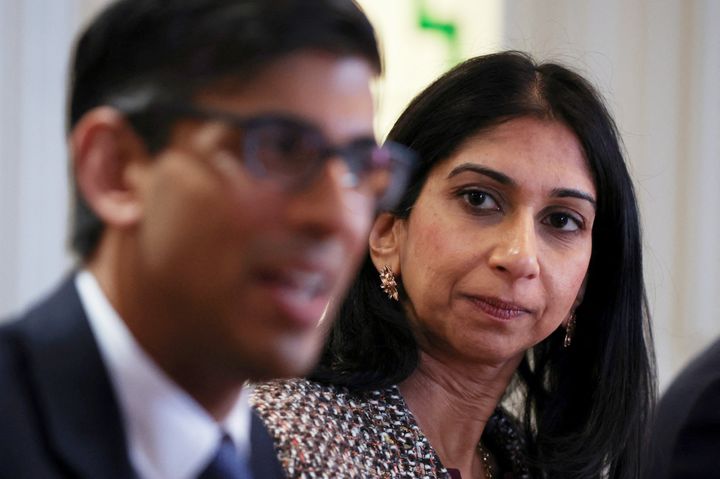 ROCHDALE, ENGLAND - APRIL 3: British Prime Minister Rishi Sunak (L) and Home Secretary Suella Braverman (R) attend a meeting with the local community and police leaders, following the announcement of a new police task force to help officers tackle grooming gangs, on April 3, 2023 in Rochdale, England. (Photo by Phil Noble - Pool/Getty Images)