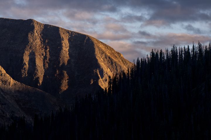 Cinnamon Pass, approximately 11 miles near Canby Mountain, is seen at sunset in September 2023 in Rio Grande National Forest, Colorado. Sitting 13,478 ft in elevation, Canby Mountain is situated on the Continental Divide high in the San Juan mountains.