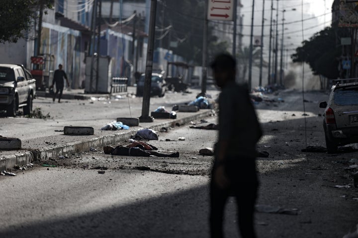 Dead bodies are seen Nov. 9 on Nasir Street near the Al-Shifa hospital after an Israeli attack.