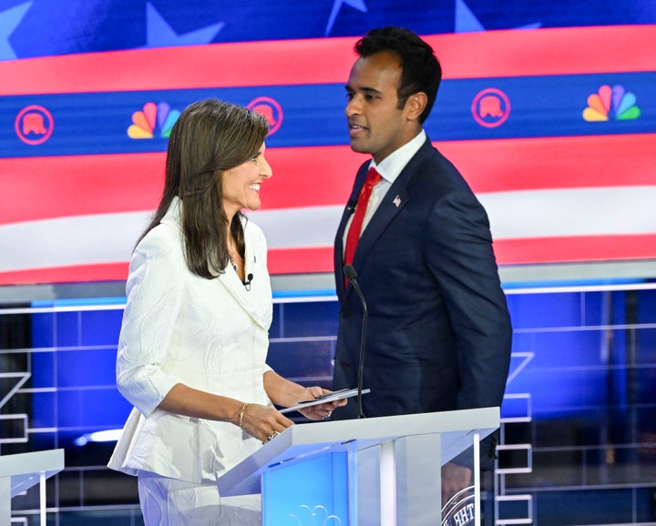 Businessman Vivek Ramaswamy (right) appears beside former United Nations Ambassador Nikki Haley at a Republican presidential debate on Nov. 8, 2023.