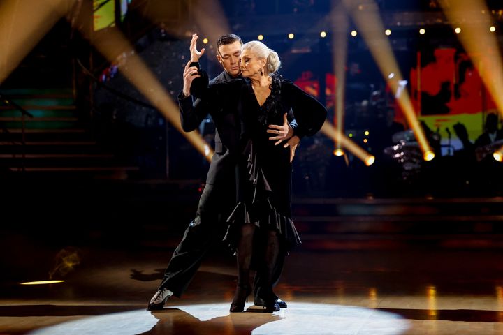 Kai and Angela performing together earlier in the series