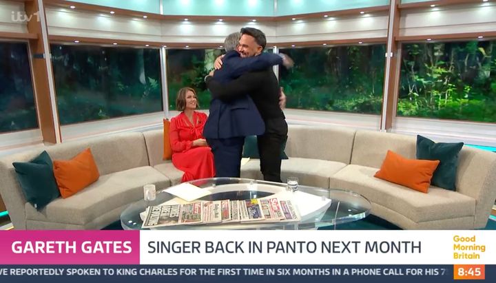 Ed Balls and Gareth Gates share a hug on Good Morning Britain