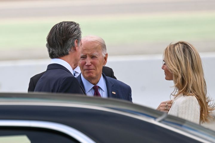 Joe Biden chats with California Gov. Gavin Newsom upon arrival at San Francisco International Airport. 