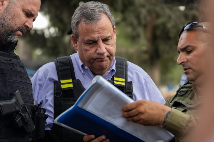 Republican presidential candidate Chris Christie reacts to photos of people killed during the attack by Hamas at Kibbutz Kfar Aza near the Gaza Border on Nov. 12.