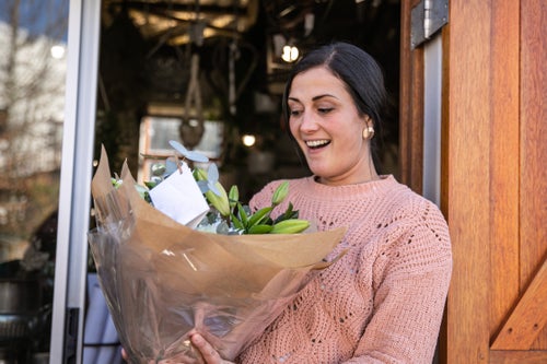 What she's actually thinking: "Oh great, now I have to find a vase for these."