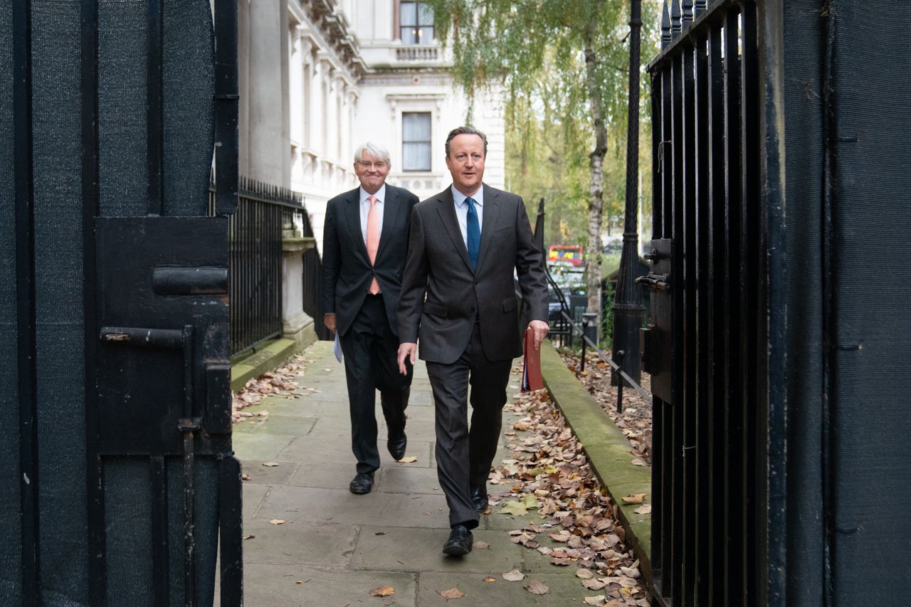 David Cameron arrives for his first cabinet meeting as foreign secretary.