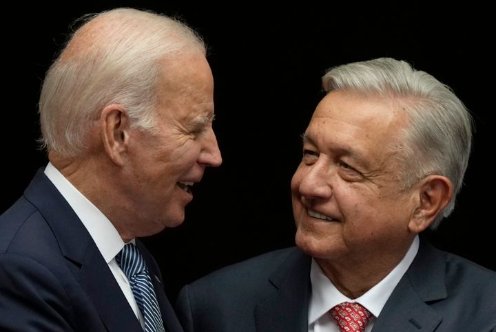 FILE - Mexican President Andres Manuel Lopez Obrador, right, and U.S. President Joe Biden shake hands at the National Palace in Mexico City, Jan. 9, 2023. (AP Photo/Fernando Llano, File)