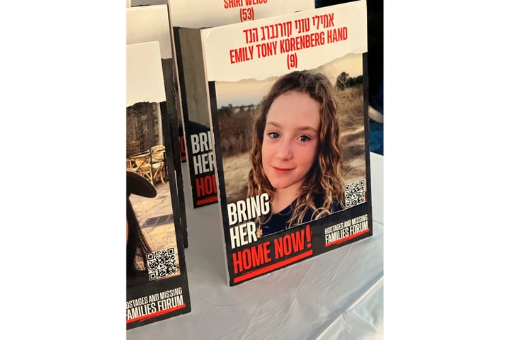 A placard with a portrait of Emily Hand, one of the hostages taken in the Oct. 7 incursion into Israel by Hamas militants, is displayed at a New York synagogue on Oct. 13, 2023. Emily’s family was initially told she had been killed, learning only recently she was alive and held in captivity in the Gaza Strip. (AP Photo/Leanne Italie)