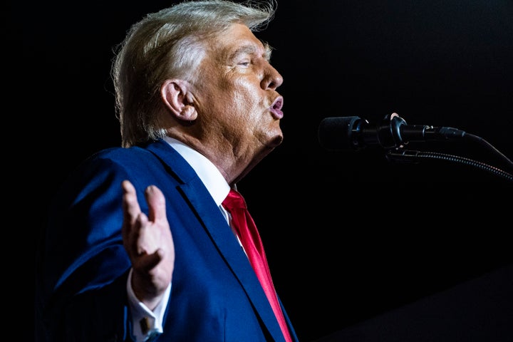 Former President Donald Trump speaks at a Nov. 8 campaign rally in Hialeah, Florida, while other Republican presidential candidates were holding a debate in Miami.