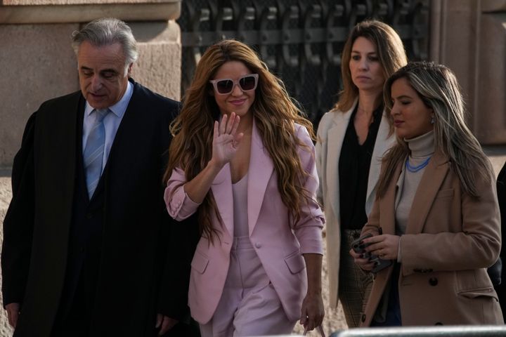 Shakira, center, arrives at court in Barcelona on Monday. 
