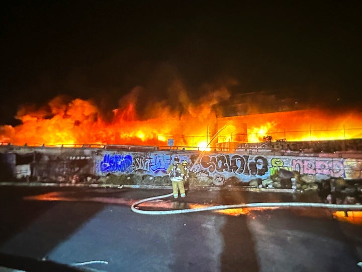 This photo provided by the California Department of Transportation shows an early morning fire along Interstate 10 near downtown Los Angeles, on Nov. 11, 2023.