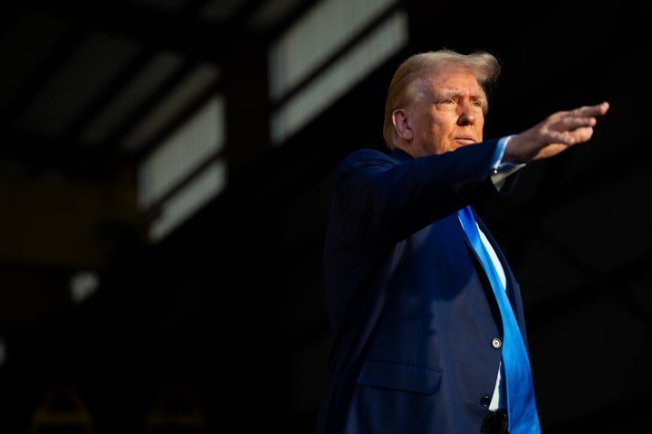 Former President Donald Trump waves goodbye at the conclusion of a campaign rally Nov. 2 at Trendsetter Engineering in Houston. Trump is insisting that the Republican National Committee not host future debates for his GOP rivals.