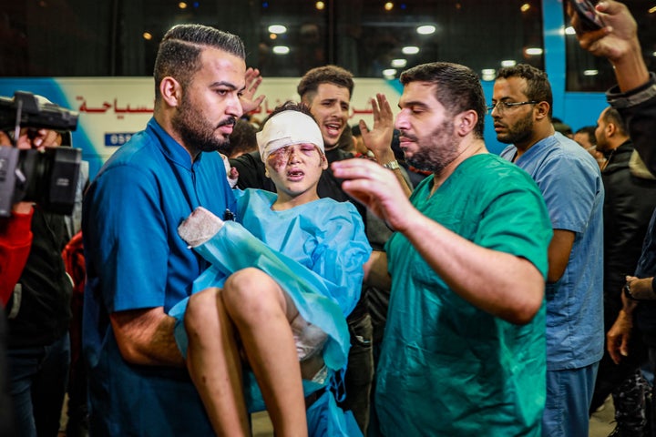 Injured Palestinians evacuated from the Indonesian Hospital in the northern Gaza Strip receive care Monday at Nasser Hospital in the southern Gaza city of Khan Yunis.