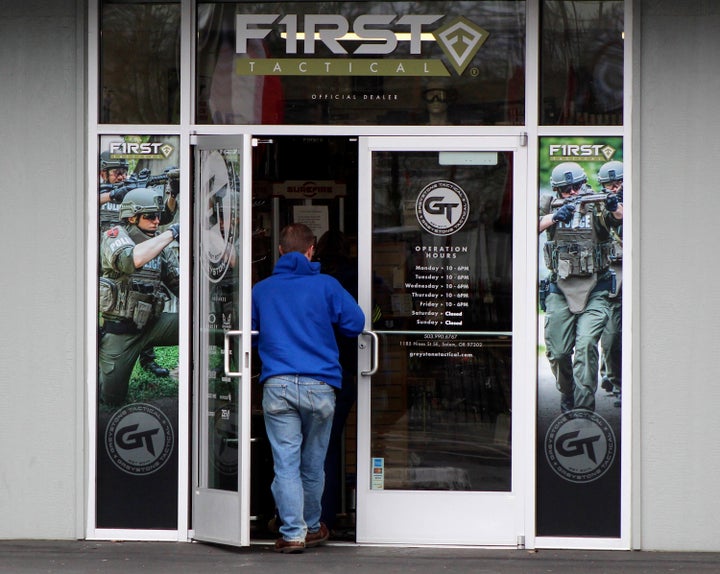 FILE - A man enters a gun shop in Salem, Ore., on Feb. 19, 2021. (AP Photo/Andrew Selsky, File)