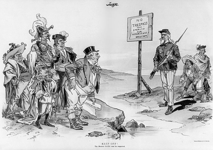Πολιτική γελοιογραφία του Gillam το 1896, ο θείος Σαμ στέκεται με τουφέκι ανάμεσα στους Ευρωπαίους και τους Λατινοαμερικάνους.