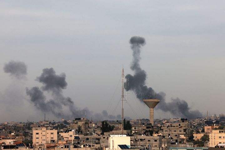 A picture taken from Rafah shows smoke billows after an Israeli strike south of Gaza City on November 22, 2023, amid ongoing battles between Israel and the Palestinian Hamas movement.