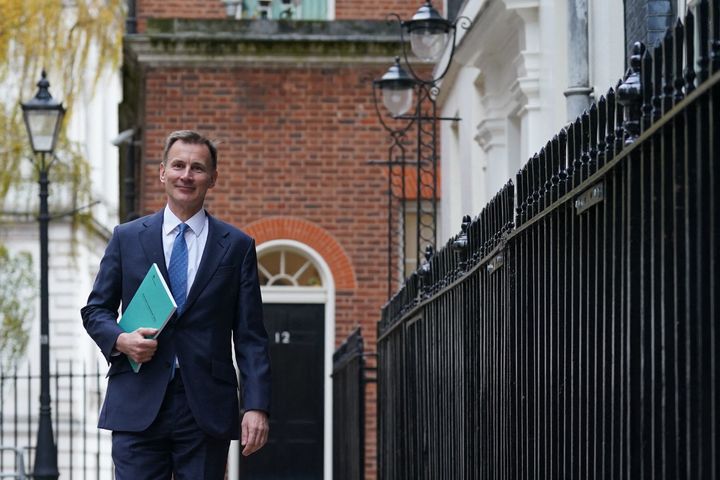 Jeremy Hunt leaves 11 Downing Street to present his Autumn Statement.