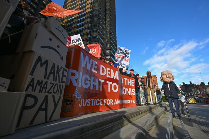 Protesters gather Friday at Amazon's London headquarters to protest wages and working conditions.