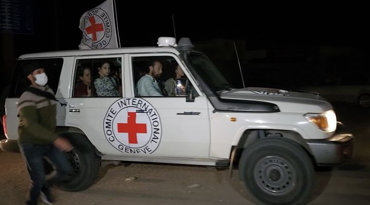 RAFAH, GAZA - NOVEMBER 25: A screen grab captured from a video shows vehicle carrying released Israeli hostages to the Rafah border as part of the exchange agreement during the four-day humanitarian pause in Rafah, Gaza on November 25, 2023. 39 Palestinian civilians will be released by Israel in exchange for the release of 13 Israeli captives from Gaza in addition to seven foreigners outside the framework of the agreement. (Photo by Stringer/Anadolu via Getty Images)