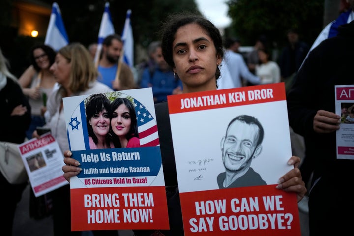 A woman takes part in a rally in solidarity with Israel, outside the Israeli Embassy in Athens, Greece, on Oct. 18, 2023. (AP Photo/Thanassis Stavrakis, File)