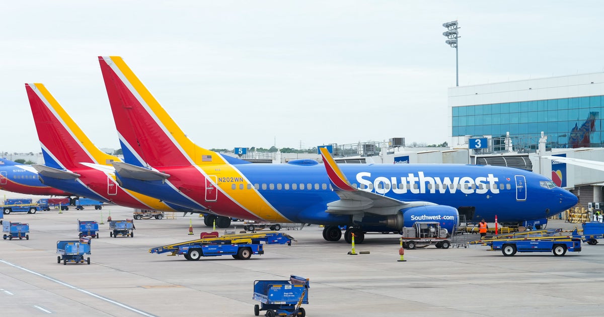 NextImg:Southwest Passenger Hospitalized After Allegedly Climbing Out On Plane's Wing