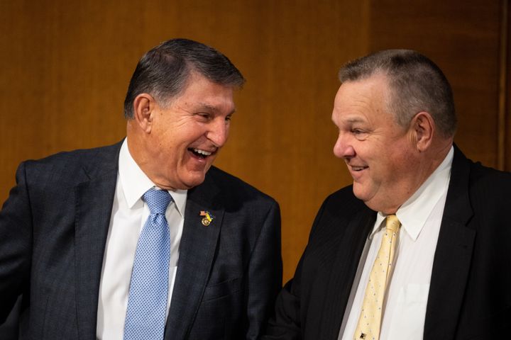 Sen. Joe Manchin (D-W.Va.), left, with Sen. Jon Tester (D-Mont.) in late October. Republicans hope Manchin's retirement will free up cash to unseat Tester and bring another Republican gain.