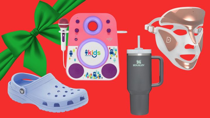 A pair of Crocs gender-neutral clogs, a kid's karaoke system, a Stanley travel mug and a Dr. Dennis Gross light mask. 