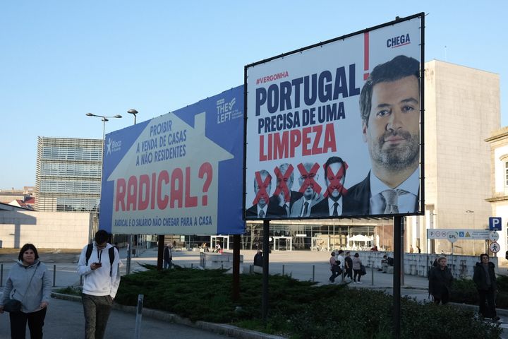 A billboard for the far-right Chega party looms over the square outside the Porto-Campanhã train station Portugal's second-largest city.