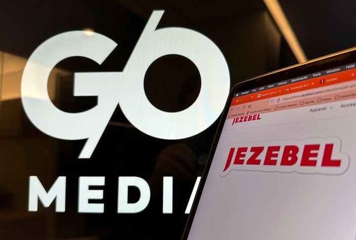 Logos for G/O Media and Jezebel are displayed on monitors in New York on Nov. 10, 2023.