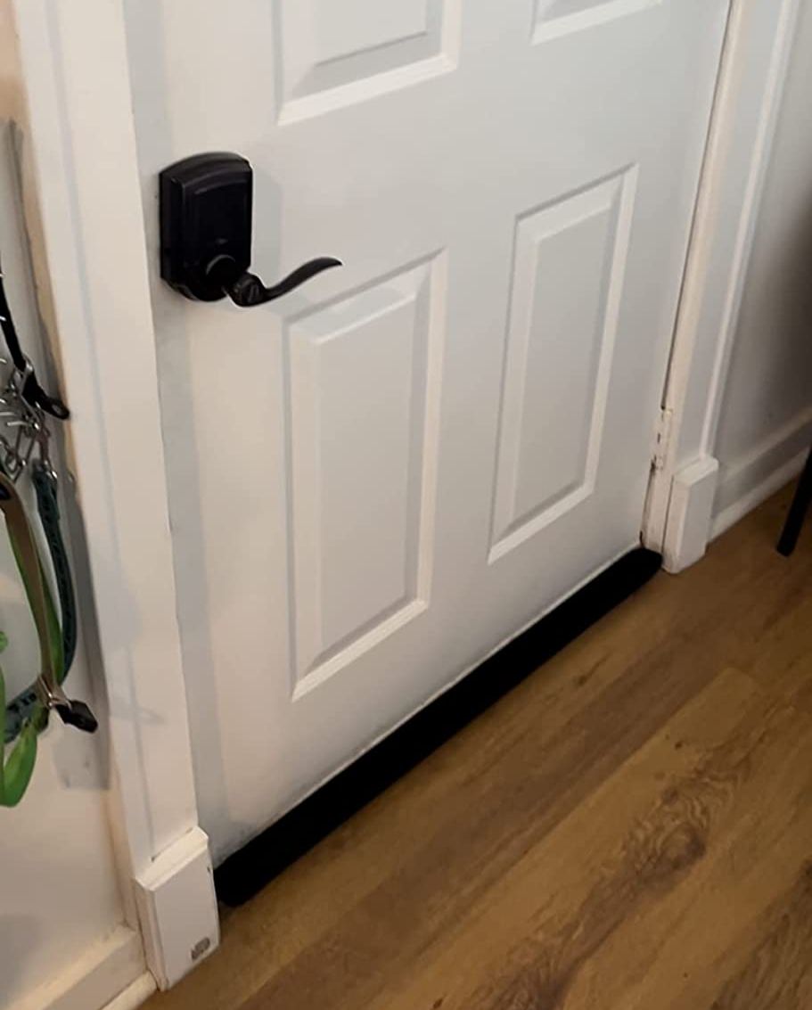 A customizable door draft stopper to plug up gaps that prevent your home from being heated (or cooled) as efficiently as possible