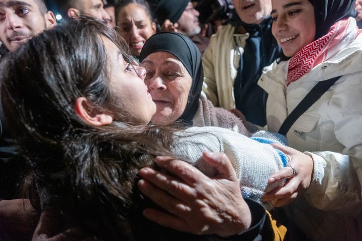 Freed Palestinian prisoners are reunited with loved ones after being released from Israeli prion on November 30, 2023 in Ramallah, West Bank. (Photo by Spencer Platt/Getty Images)