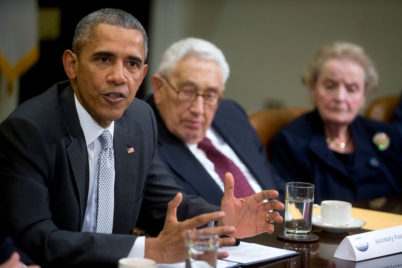 Kissinger (center) remained a member in good standing of the Washington political, press and societal elite throughout his life, even among leaders like President Barack Obama (left), who criticized the human rights abuses that took place on his watch.
