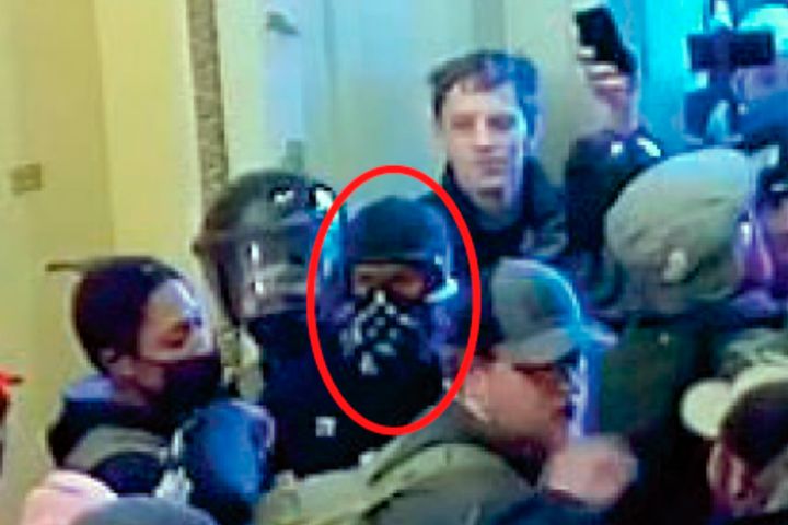 This image from U.S. Capitol Police video shows a man identified as Pelham, circled in red, appearing at the Capitol on Jan. 6, 2021, in Washington.
